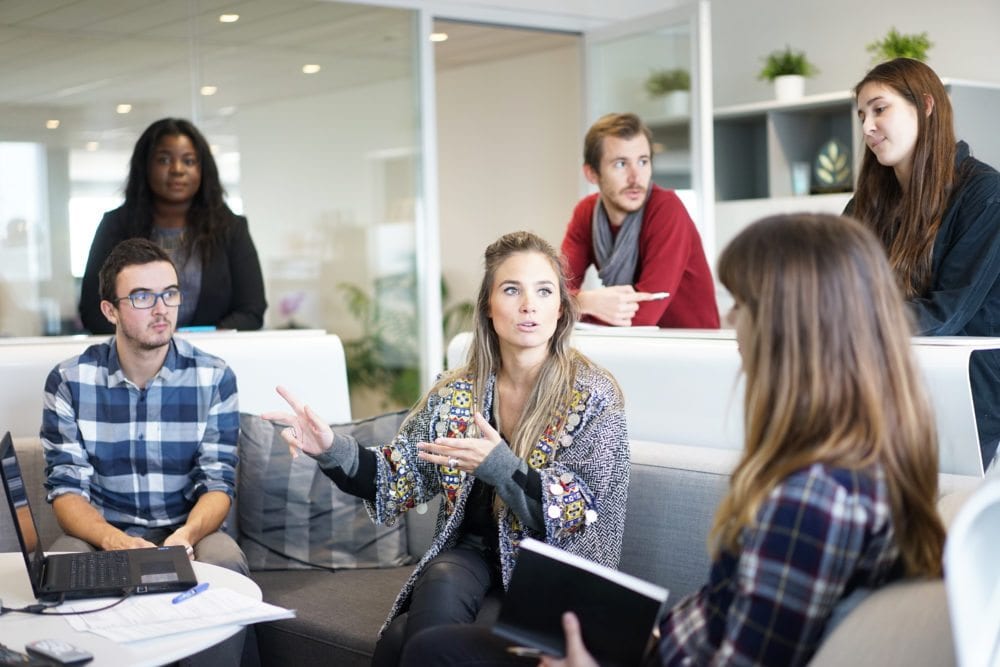 Employer inspiring her employees